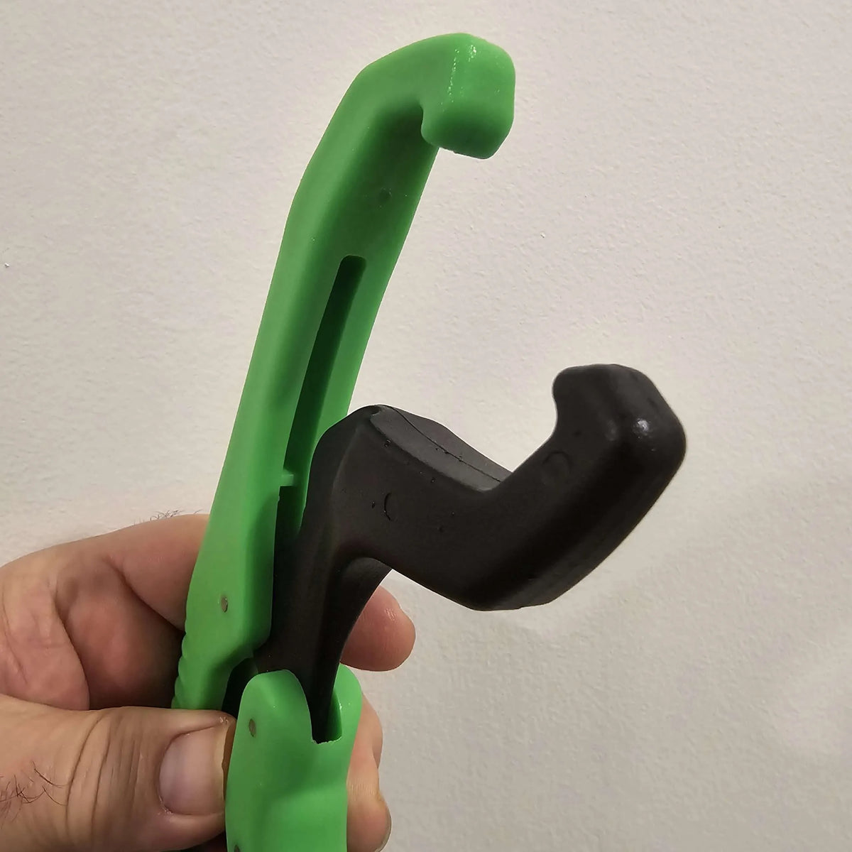 ReproBaits Tackle 9-inch floating fish lip gripper in green