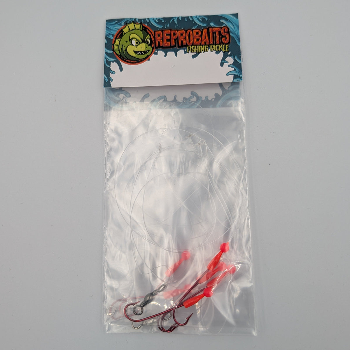 ReproBaits two-hook whiting dropper rig with size #4 red long-shank hooks, red lumo beads and clear fishing line.